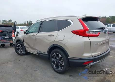 2019 Honda Cr-V Touring z USA, uszkodzony, nr VIN 5J6RW1H94KL002764